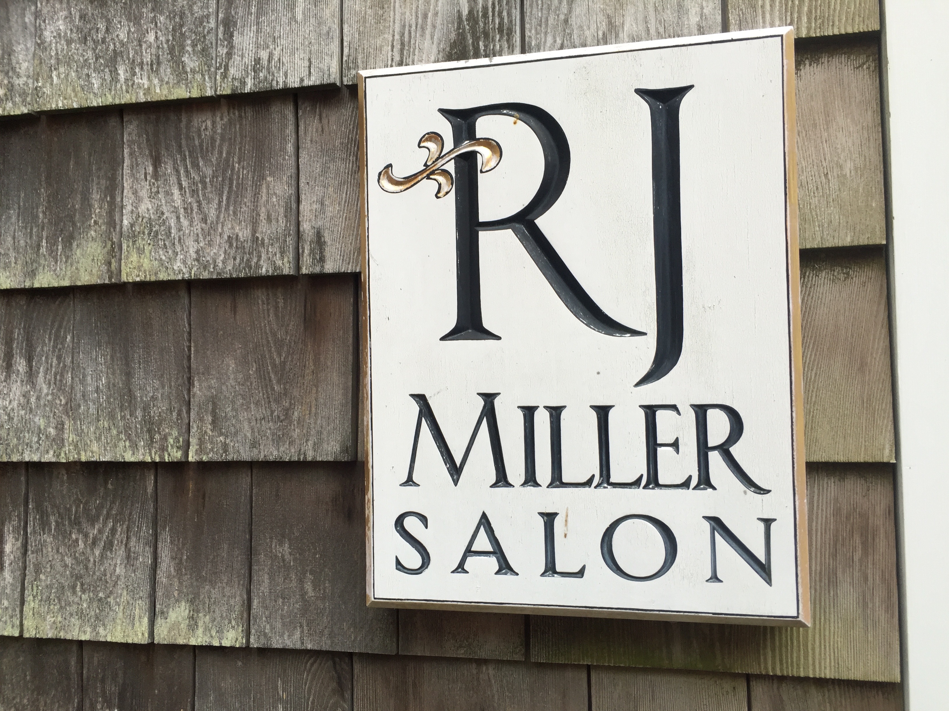 Sign that reads RJ Miller Salon outside of the Nantucket office